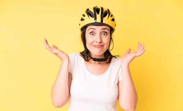 Young Adult Pretty Woman Feeling Puzzled Confused Doubting Bike Helmet — Stockfoto