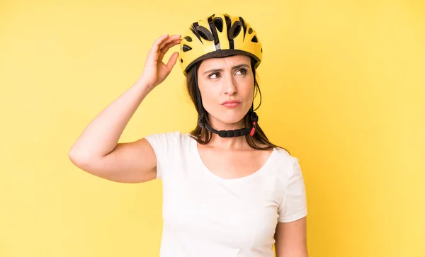 Young Adult Pretty Woman Feeling Puzzled Confused Scratching Head Bike — Stockfoto