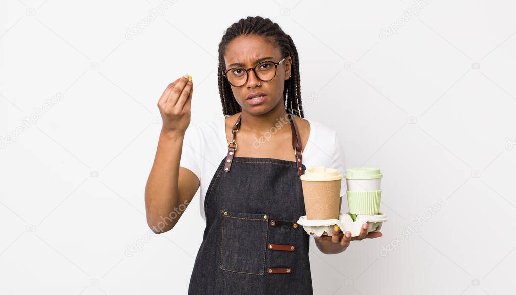 young adult black woman making capice or money gesture, telling you to pay. take away coffees concept