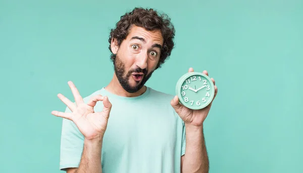 Young Adult Hispanic Crazy Man Alarm Clock — Stock Photo, Image