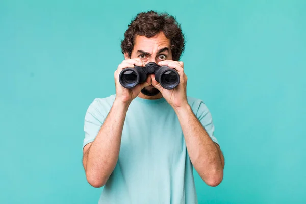 Young Adult Hispanic Crazy Man Binoculars Searching Concept — Stock Photo, Image