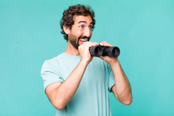 Young Adult Hispanic Crazy Man Binoculars Searching Concept — Stock Photo, Image