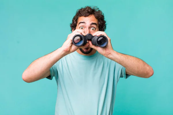 Young Adult Hispanic Crazy Man Binoculars Searching Concept — Stock Photo, Image