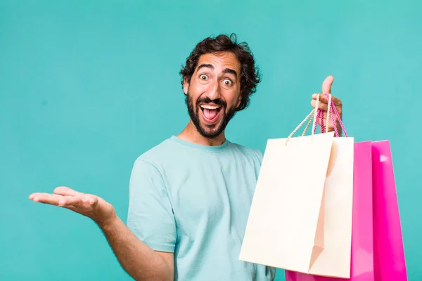 Young Adult Hispanic Crazy Man Shopping Bags Concept — Stock Photo, Image