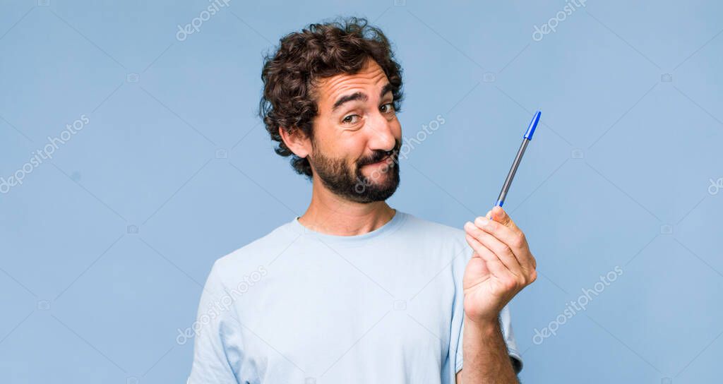 young adult hispanic crazy man with a pen