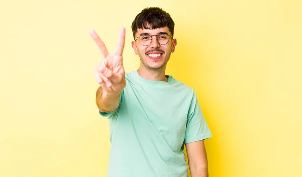 Young Adult Hispanic Man Smiling Looking Happy Carefree Positive Gesturing — Stock Photo, Image