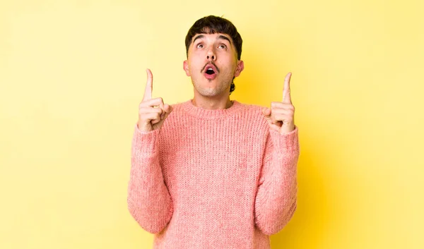 Young Adult Hispanic Man Looking Shocked Amazed Open Mouthed Pointing — Stock Photo, Image