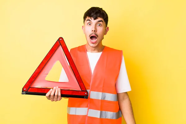 Young Hispanic Man Looking Very Shocked Surprised Emergency Car Triangle — Stock Photo, Image