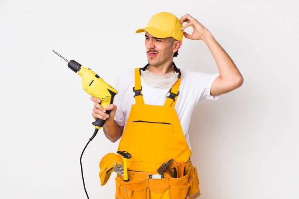 Hispanic Handyman Smiling Happily Daydreaming Doubting Drill Concept — Stock Photo, Image