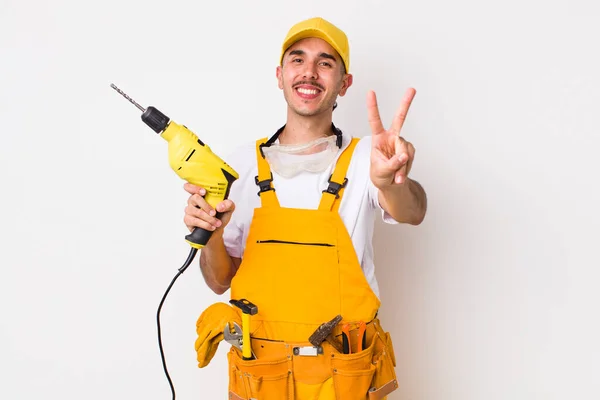 Hispanic Handyman Smiling Looking Happy Gesturing Victory Peace Drill Concept — Stock Photo, Image