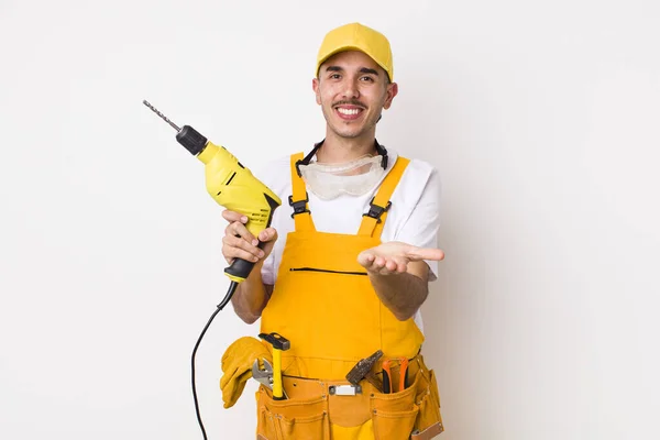 Hispanic Handyman Smiling Happily Friendly Offering Showing Concept Drill Concept — Stock Photo, Image