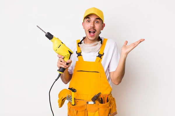 Hispanic Handyman Feeling Happy Astonished Something Unbelievable Drill Concept — Stock Photo, Image