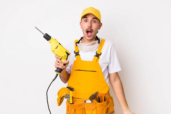 Hispanic Handyman Looking Very Shocked Surprised Drill Concept — Stock Photo, Image