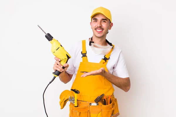 Hispanic Handyman Smiling Cheerfully Feeling Happy Showing Concept Drill Concept — Stock Photo, Image