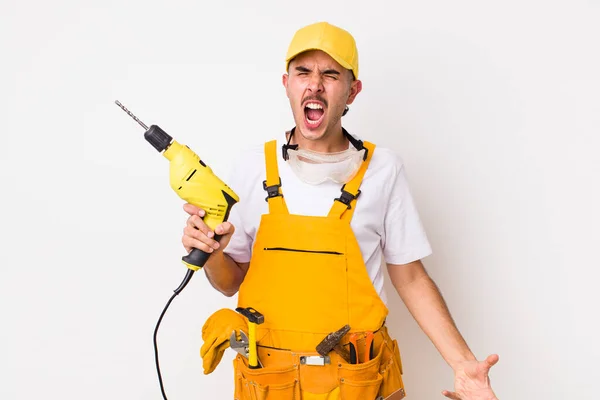 Hispanic Handyman Shouting Aggressively Looking Very Angry Drill Concept — Stock Photo, Image