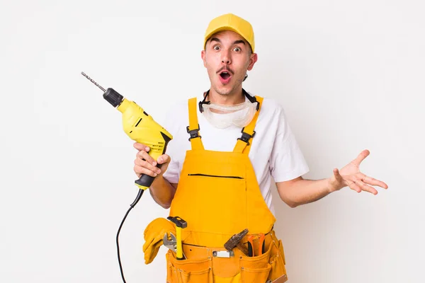 Hispanic Handyman Amazed Shocked Astonished Unbelievable Surprise Drill Concept — Stock Photo, Image