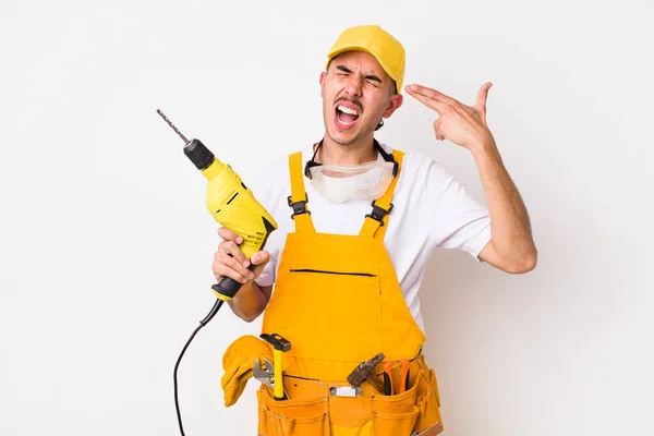 Hispanic Handyman Looking Unhappy Stressed Suicide Gesture Making Gun Sign — Stock Photo, Image