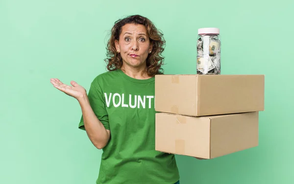 Middle Age Woman Feeling Puzzled Confused Doubting Volunteer Donation Concept — Stock Photo, Image
