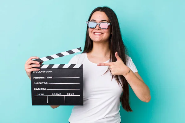 Young Adult Woman Smiling Cheerfully Feeling Happy Pointing Side Movie — Stockfoto