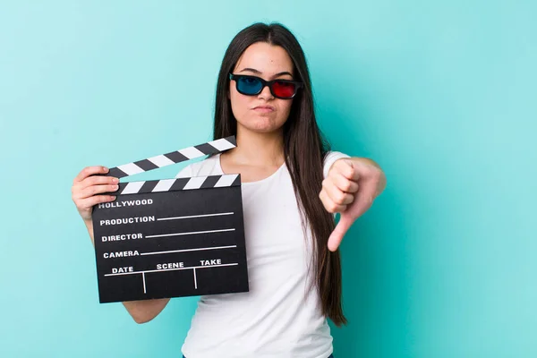 Young Adult Woman Feeling Cross Showing Thumbs Movie Concept — Stockfoto