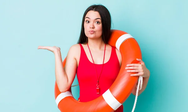 Young Adult Woman Feeling Puzzled Confused Doubting Lifeguard Concept — Stock Photo, Image