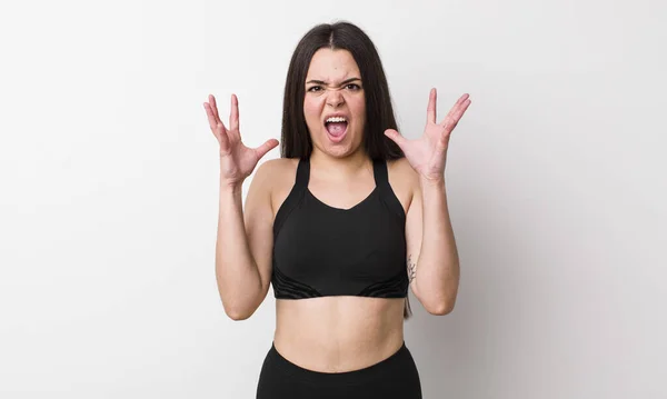 Young Adult Woman Screaming Hands Air Fitness Concept — Stockfoto