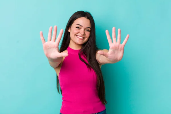 Young Adult Woman Smiling Looking Friendly Showing Number Ten Tenth — Stockfoto