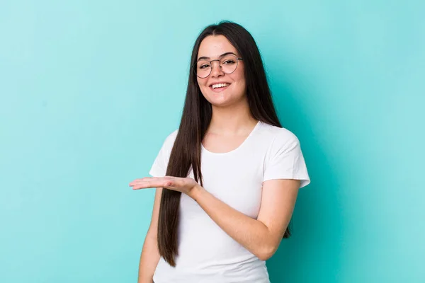 Young Adult Woman Smiling Cheerfully Feeling Happy Showing Concept Copy — Stock Photo, Image