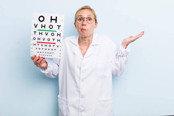 Young Adult Blonde Woman Feeling Puzzled Confused Doubting Optical Vision — Stockfoto