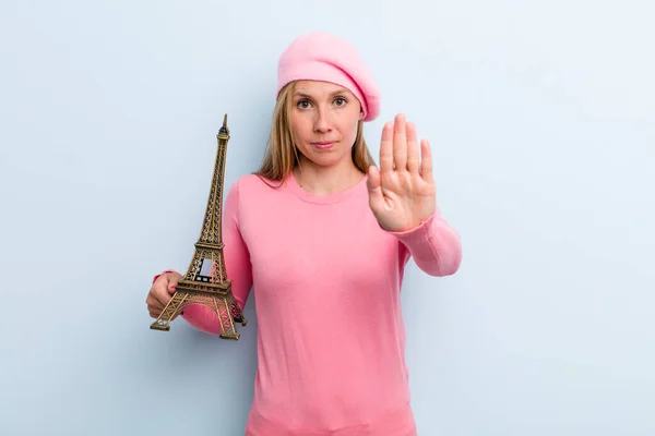 Young Adult Blonde Woman Looking Serious Showing Open Palm Making — Stock Photo, Image