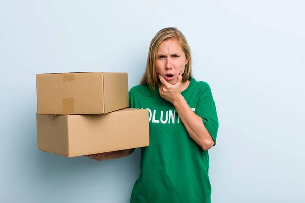 Young Adult Blonde Woman Mouth Eyes Wide Open Hand Chin — Stock Photo, Image