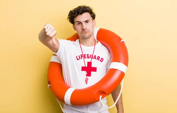 Young Handsome Guy Feeling Cross Showing Thumbs Lifeguard Concept — Stock Photo, Image