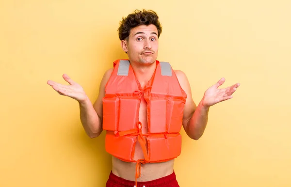 Young Handsome Guy Feeling Puzzled Confused Doubting Life Jacket Boat — Stock Photo, Image