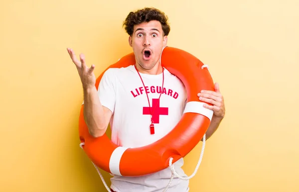Young Handsome Guy Amazed Shocked Astonished Unbelievable Surprise Lifeguard Concept — Stock Photo, Image