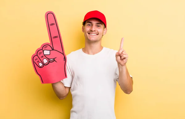Young Handsome Guy Smiling Looking Friendly Showing Number One Number — Stock Photo, Image