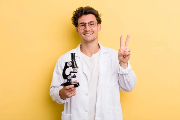 Young Handsome Guy Smiling Looking Friendly Showing Number Two Science — Stock Photo, Image