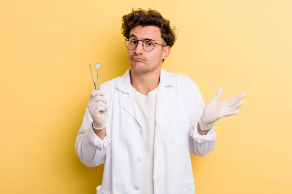 Young Handsome Guy Feeling Puzzled Confused Doubting Dentist Concept — Stockfoto