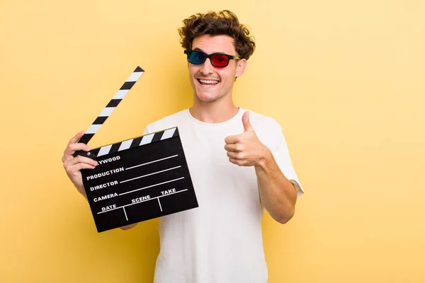 Young Handsome Guy Feeling Proud Smiling Positively Thumbs Movie Concept — Stock Photo, Image