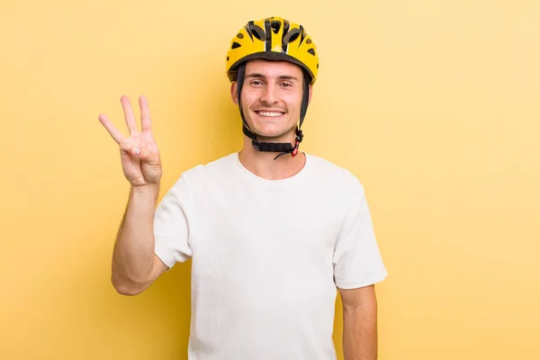 Young Handsome Guy Smiling Looking Friendly Showing Number Three Bike — Stockfoto