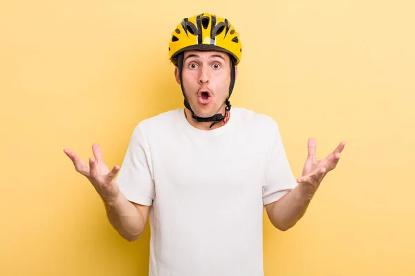 Young Handsome Guy Amazed Shocked Astonished Unbelievable Surprise Bike Concept — Stock Photo, Image