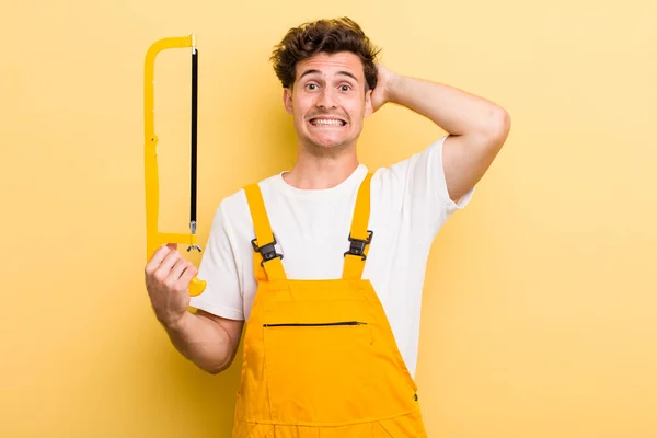 Young Handsome Guy Feeling Stressed Anxious Scared Hands Head Handyman — Stock Photo, Image