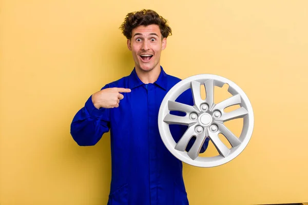 Young Handsome Teenager Feeling Happy Pointing Self Excited Car Mechanic — Foto de Stock