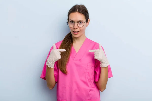 Young Adult Woman Feeling Happy Pointing Self Excited Nurse Concept — Stockfoto