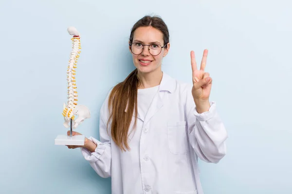 Young Adult Woman Smiling Looking Happy Gesturing Victory Peace Spine — Stockfoto