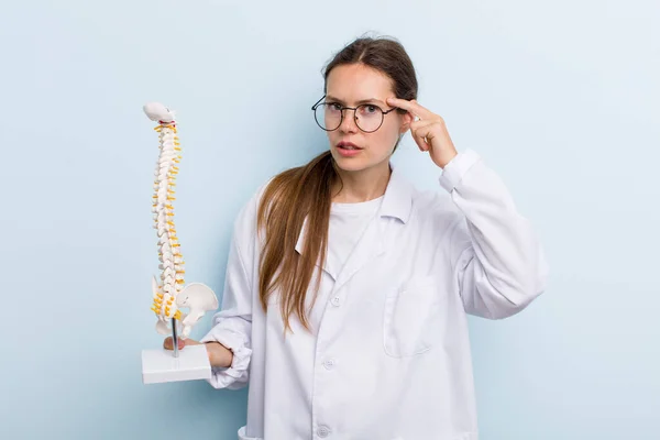Young Adult Woman Feeling Confused Puzzled Showing You Insane Spine — Stockfoto