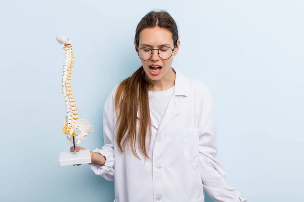 Young Adult Woman Shouting Aggressively Looking Very Angry Spine Specialist — Stockfoto