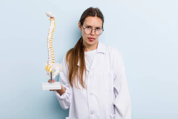 Young Adult Woman Feeling Disgusted Irritated Tongue Out Spine Specialist — Stockfoto