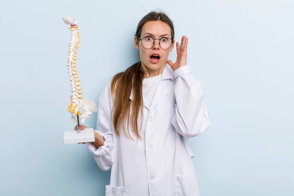 Young Adult Woman Screaming Hands Air Spine Specialist Concept — Stockfoto
