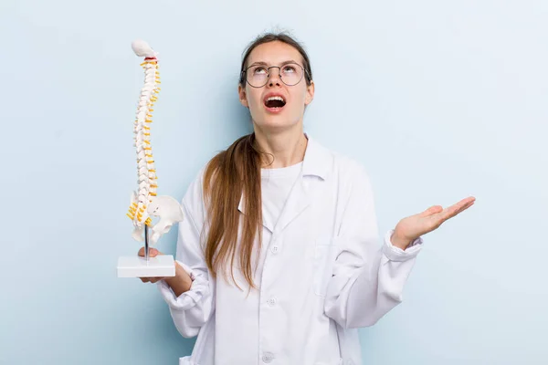 Young Adult Woman Looking Desperate Frustrated Stressed Spine Specialist Concept — Stock Fotó