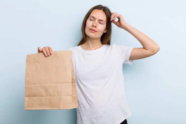 Young Adult Woman Smiling Happily Daydreaming Doubting Delivery Take Away — Fotografia de Stock